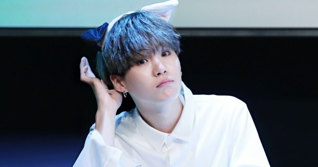 Suga de BTS révèle ce que c'était que de partager une chambre avec 10 autres stagiaires