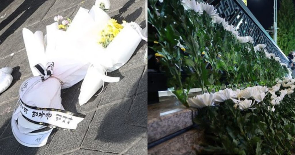 Des personnes en deuil créent des monuments commémoratifs et laissent des fleurs aux victimes de la tragédie d'Itaewon